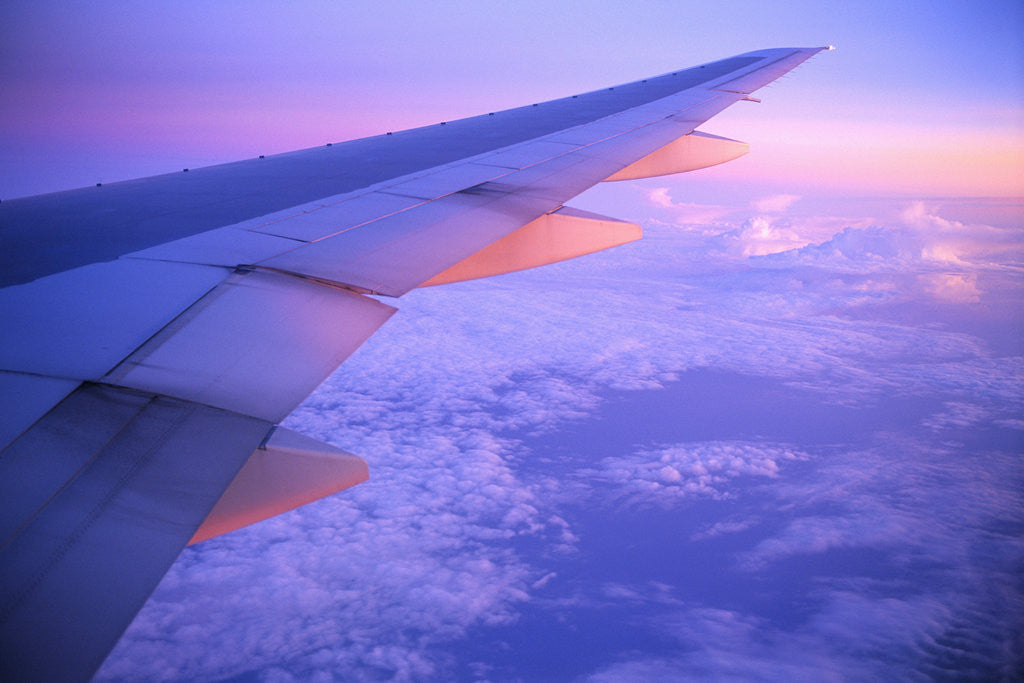 Detail of Setting Sun Hitting Airplane Wing by Anonymous