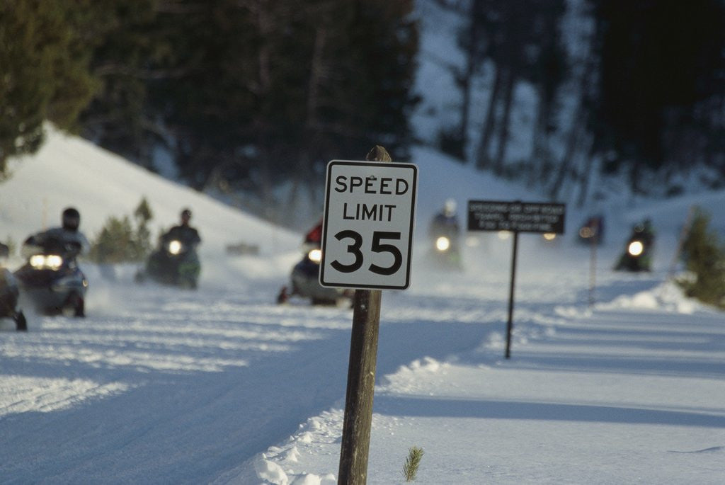 Detail of Speed Limit Sign and Snowmobiles by Anonymous