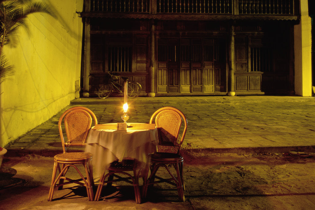 Detail of Empty Restaurant Table and Chairs on Street by Anonymous