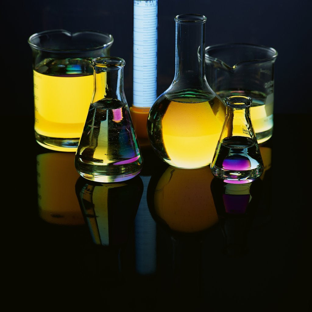 Detail of Laboratory Flasks and Beakers Filled with Liquid by Corbis