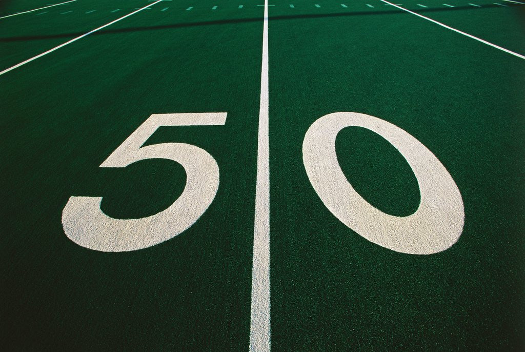 Detail of 50-Yard Line of Football Field by Corbis
