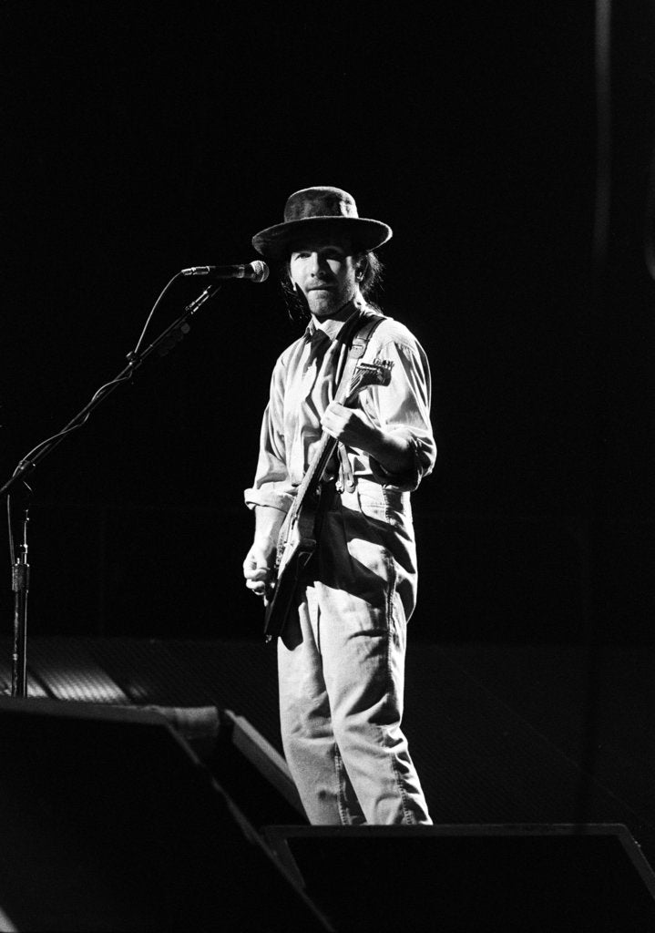 Detail of U2 performing at the NEC 1987 by Reavenall