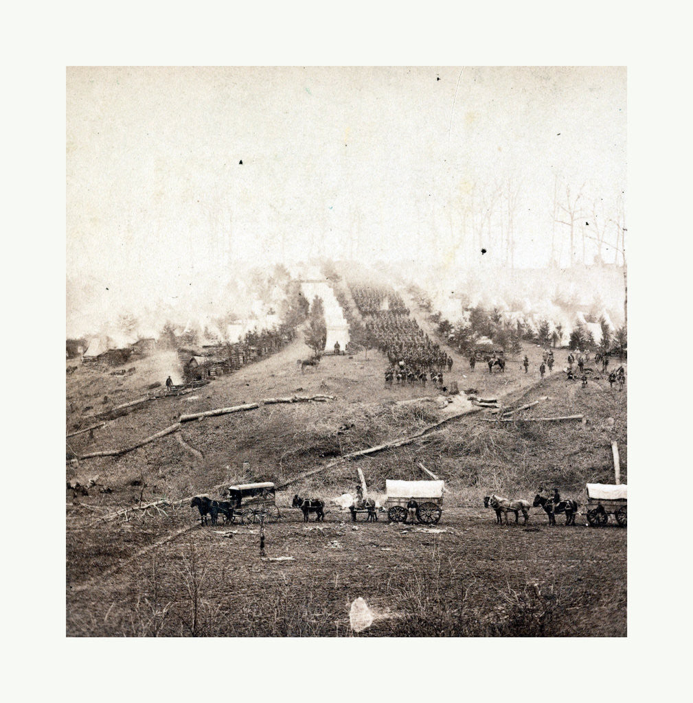 Detail of American Civil War: Three Horse-Drawn Covered Wagons in the Foreground. Soldiers Marching in Formation Between Rows of Small Cabins and Tents in the Background by Anonymous