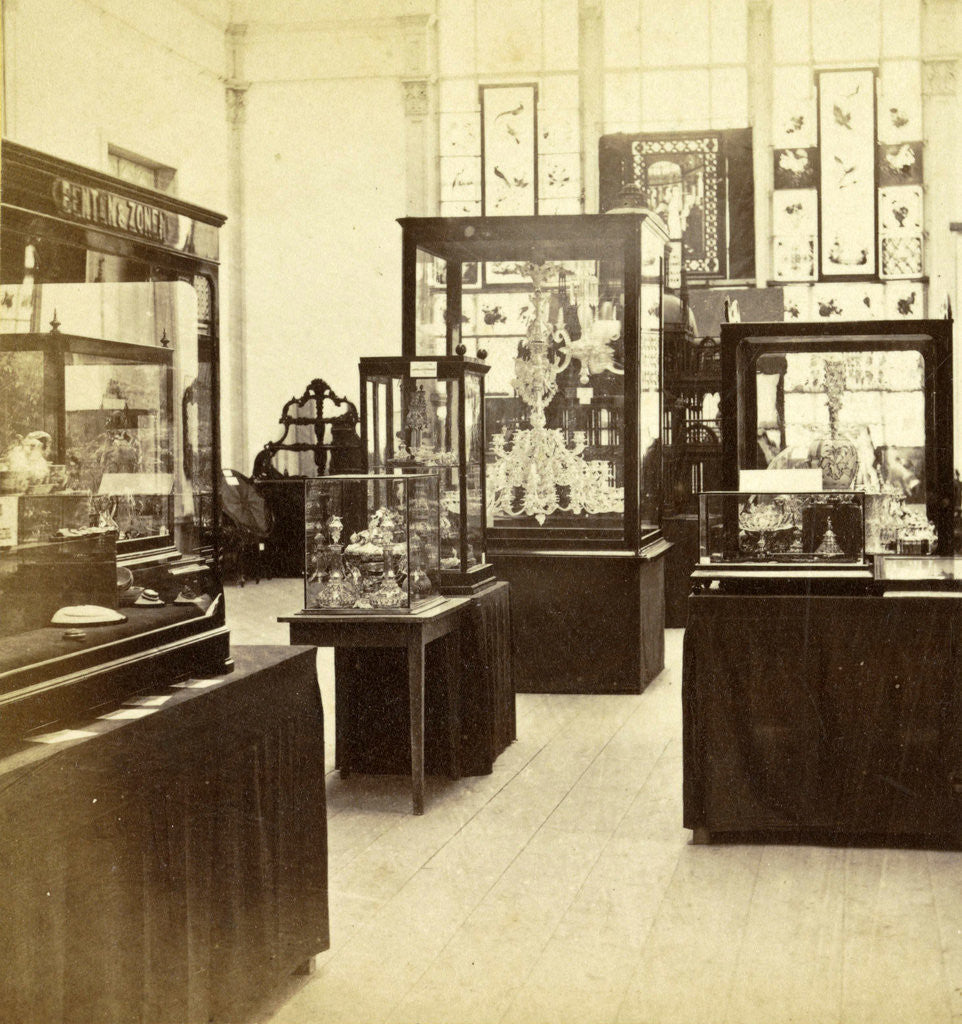 Detail of objects in display cases at the exhibition for National Industry and Art in the Palace of Industry, Amsterdam by Anonymous