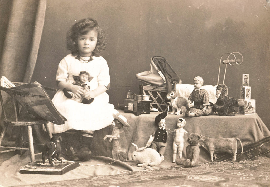 Detail of Marba Titzenthaler, daughter of the photographer, in the house Friedrichstrasse Berlin, with toys, Germany by Waldemar Titzenthaler