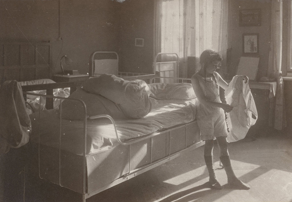 Detail of Marba Titzenthaler, daughter of the photographer, in the bedroom of the house Friedrichstrasse, Berlin, Germany by Waldemar Titzenthaler