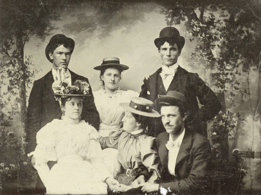 Detail of Group portrait of three men and three women, sitting in a studio with painted cloth background (forest or park scene) by Anonymous