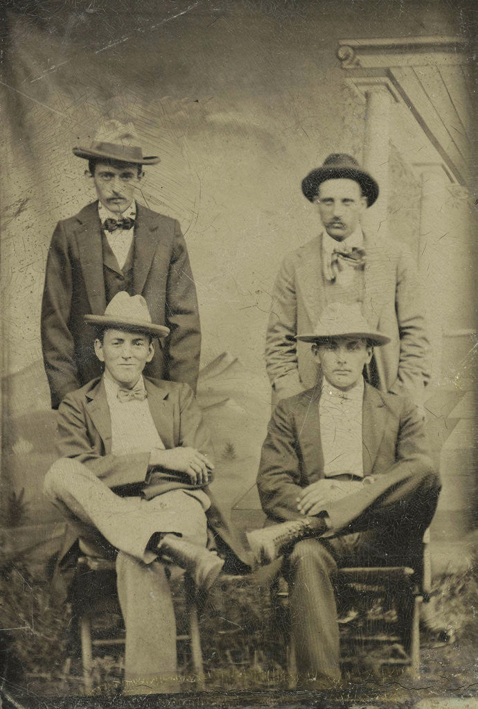 Detail of Portrait of four men sitting and standing in front of a painted backdrop, architecture by Anonymous