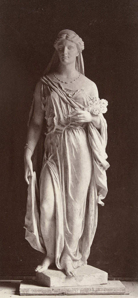 Detail of Marble statue of a woman in robe and veil over her head, in her left hand she carries a bouquet of flowers by Louis-Emile Durandelle