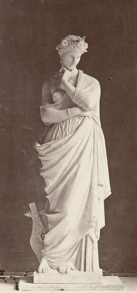 Detail of Marble statue of a woman in robe with a bare chest by Louis-Emile Durandelle