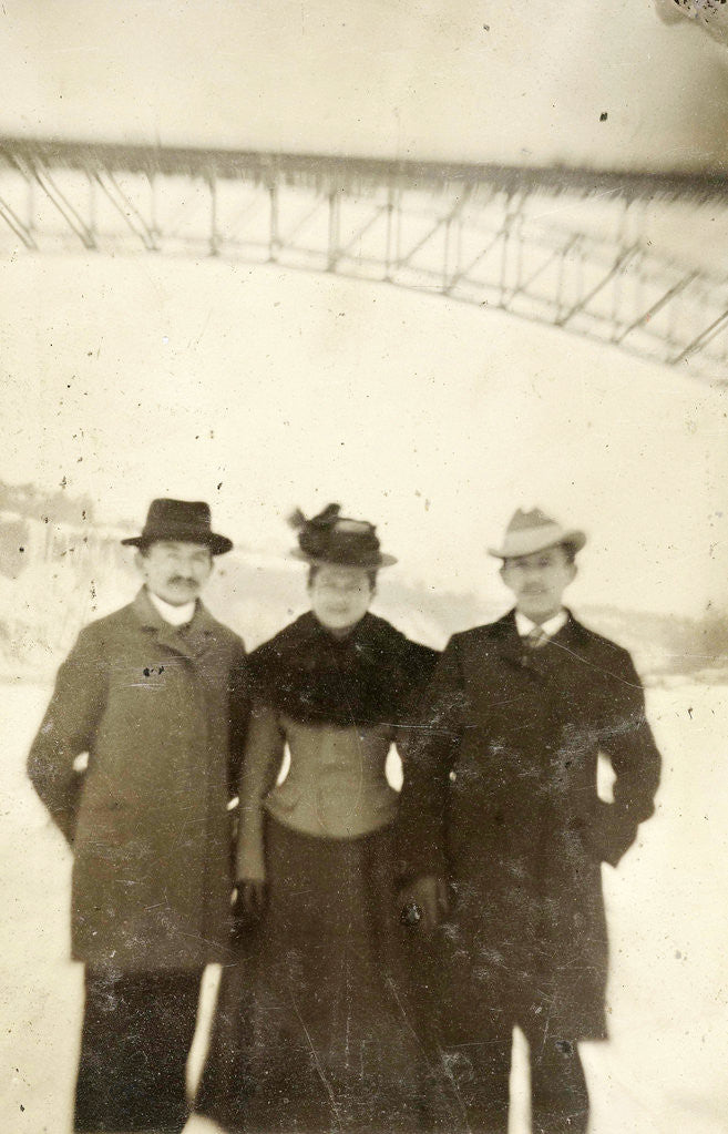 Detail of Portrait of two men and a woman, standing in the open air by Anonymous