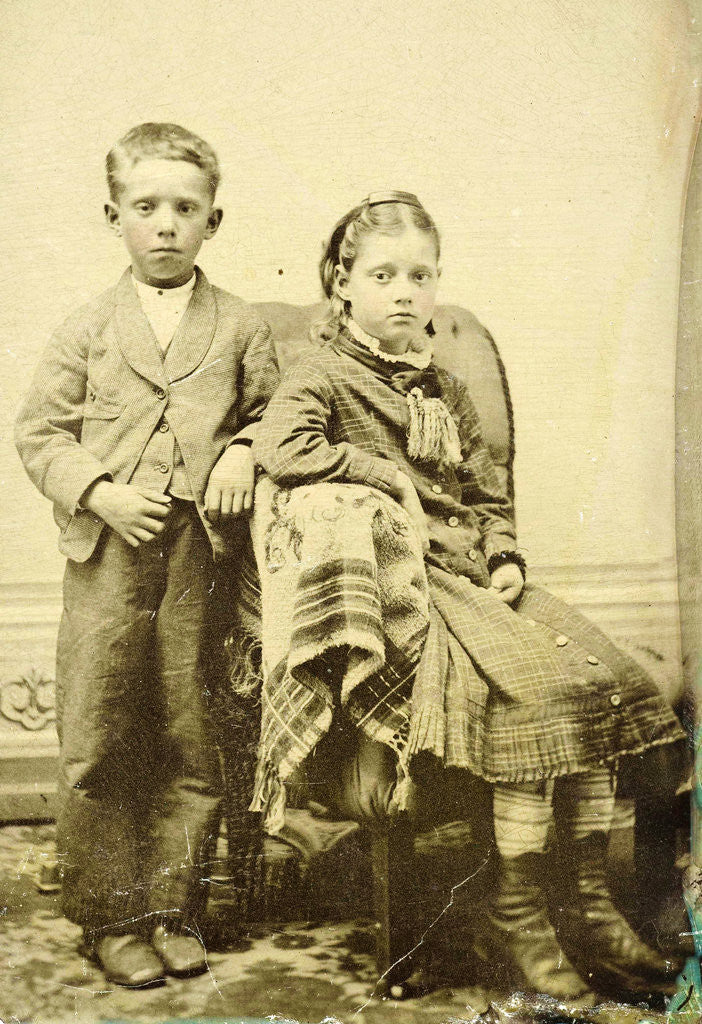 Detail of Portrait of a girl and boy, Sitting and standing in a studio setting by Anonymous