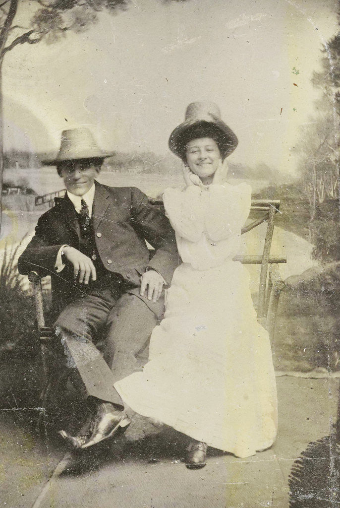 Detail of Portrait of a man and woman (Chas and Bo), sitting in front of a painted backdrop (with more trees, Puddin Bay) by Anonymous