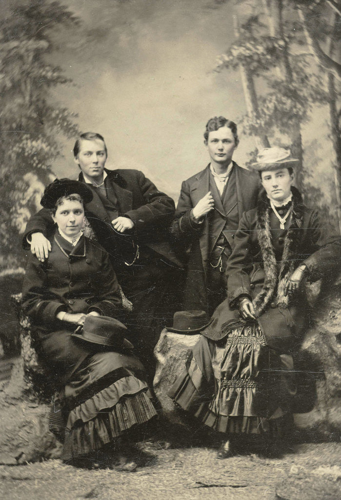 Detail of Two men and two women standing and sitting in front of a painted backdrop (forest) by Anonymous