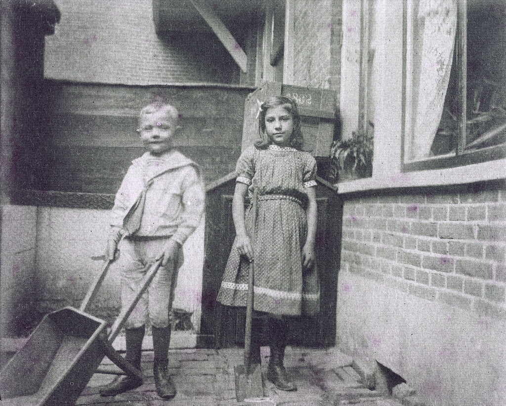 Detail of Two children, with wheelbarrow and shovel by Anonymous