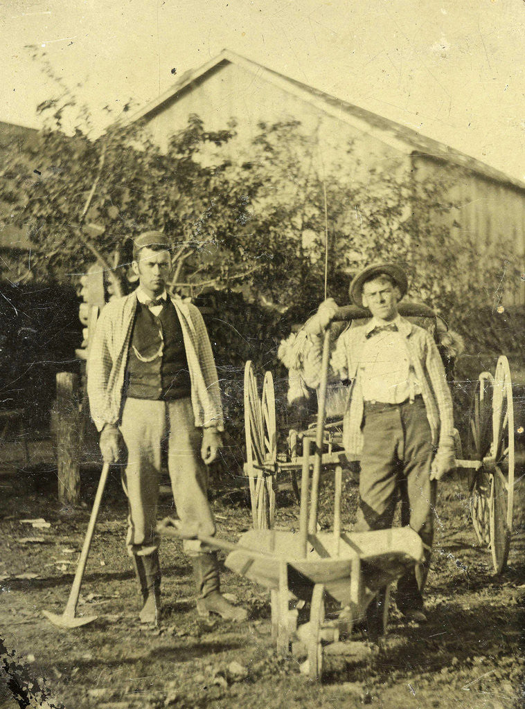 Detail of Two men with tools, a wheelbarrow and cart by Anonymous