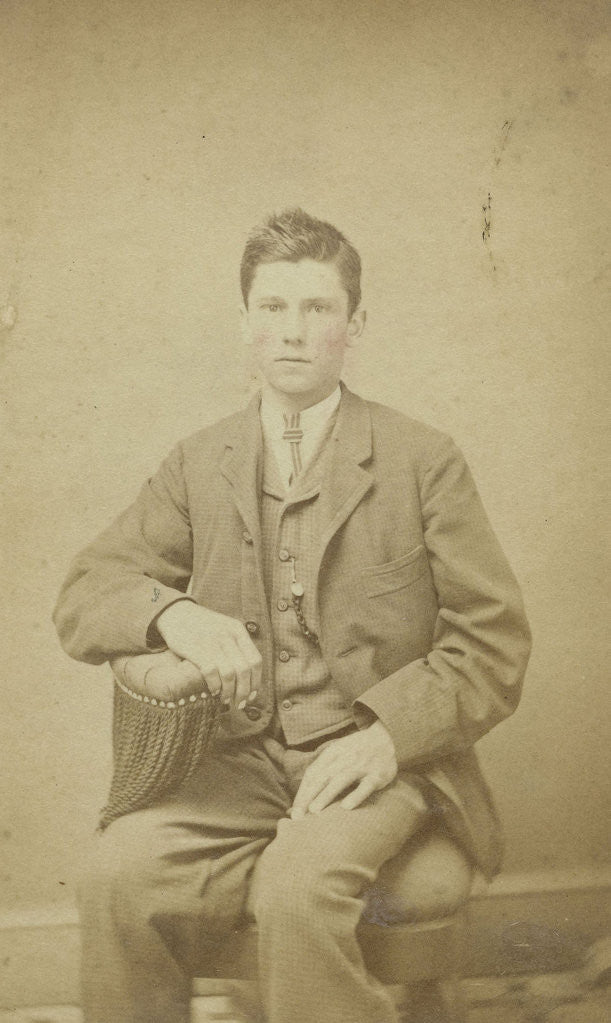 Detail of Two women and a man posing in a ferrotypietent by Anonymous