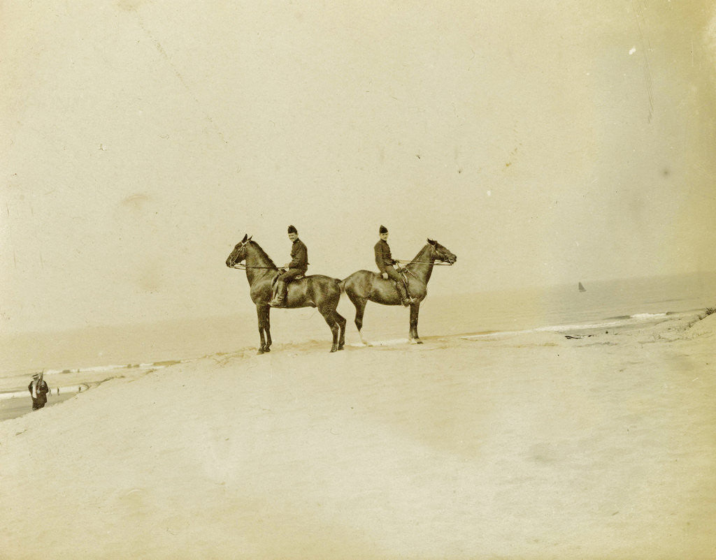 Detail of Two men (military?) Riding on a dune, the Netherlands, with the sea in the background by Anonymous
