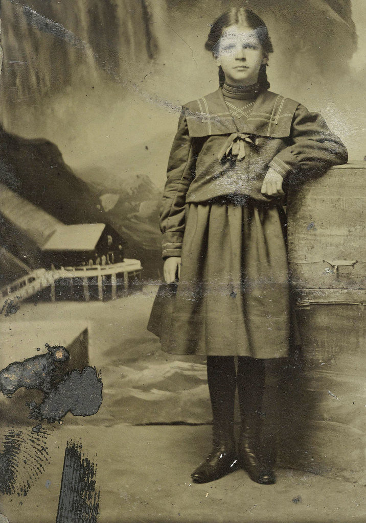 Detail of Portrait of a girl in front of a painted backdrop of Niagara Falls by Anonymous