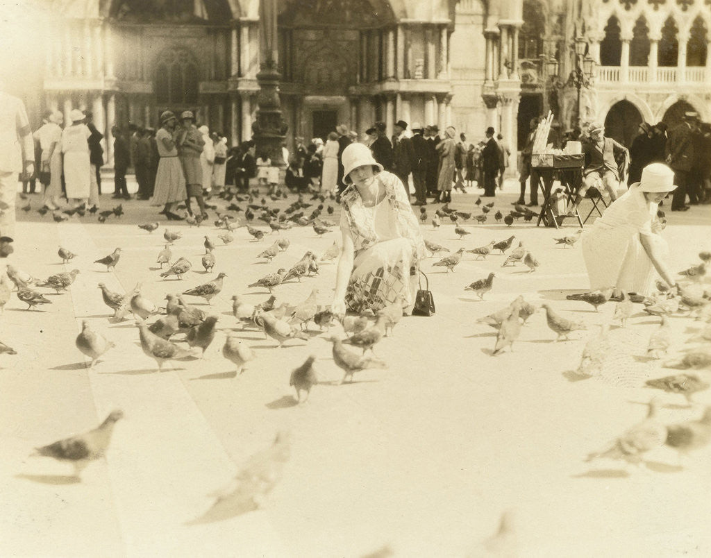 Detail of American tourists wearing pigeons in Piazza San Marco, Venice, Italy by Anonymous