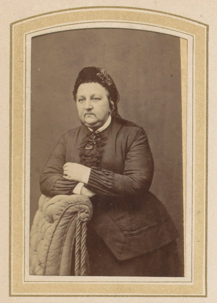 Detail of Portrait of a woman with a hat leaning on an armchair by Johannes H. Kramer