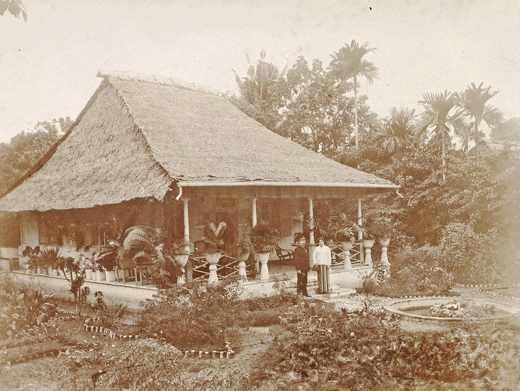 Detail of Man and woman posing for a house with a garden in Ambon, Indonesia by Anonymous