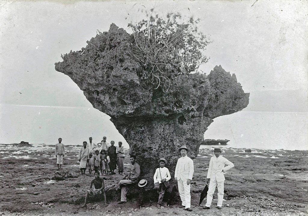 Detail of Group of people at rock formation Stone Hat (Batu Tjepeh) in Ambon, Indonesia by Anonymous