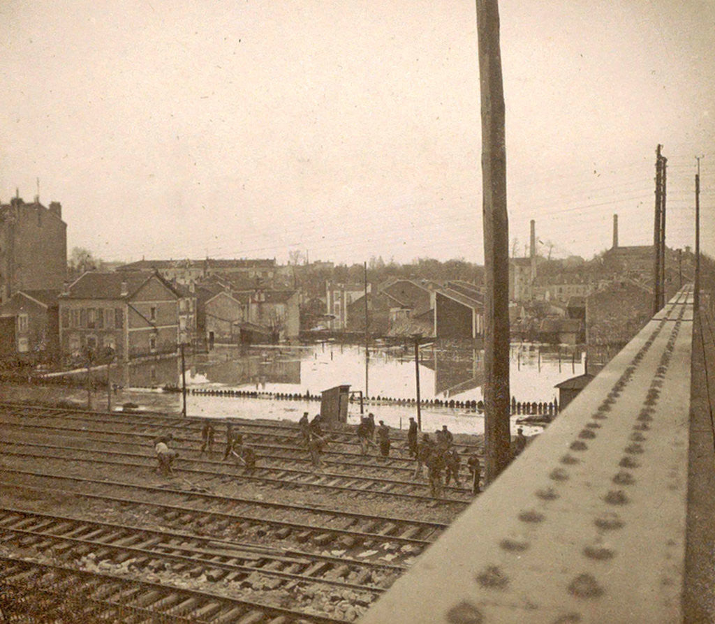 Detail of Work on railway tracks during the flooding of Paris, seen from a bridge by France