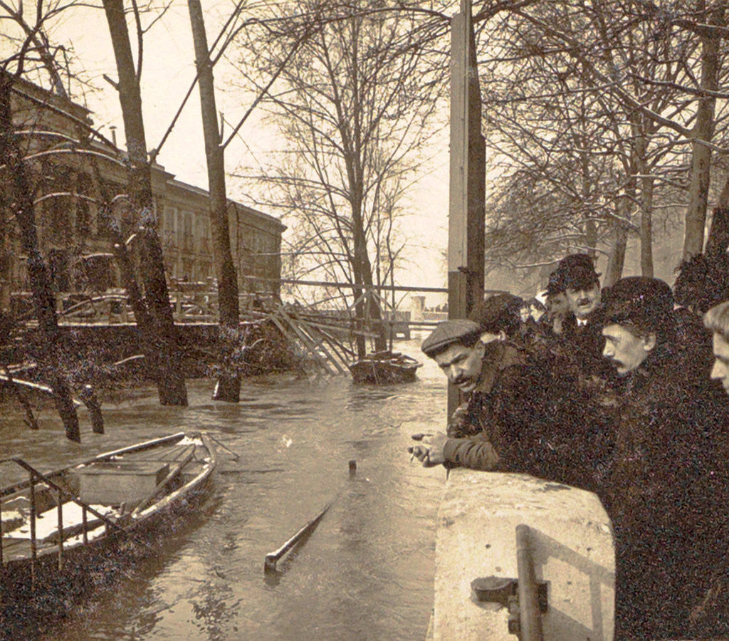 Detail of People watching from the wharf to the high water level of the Seine in Paris France by Anonymous