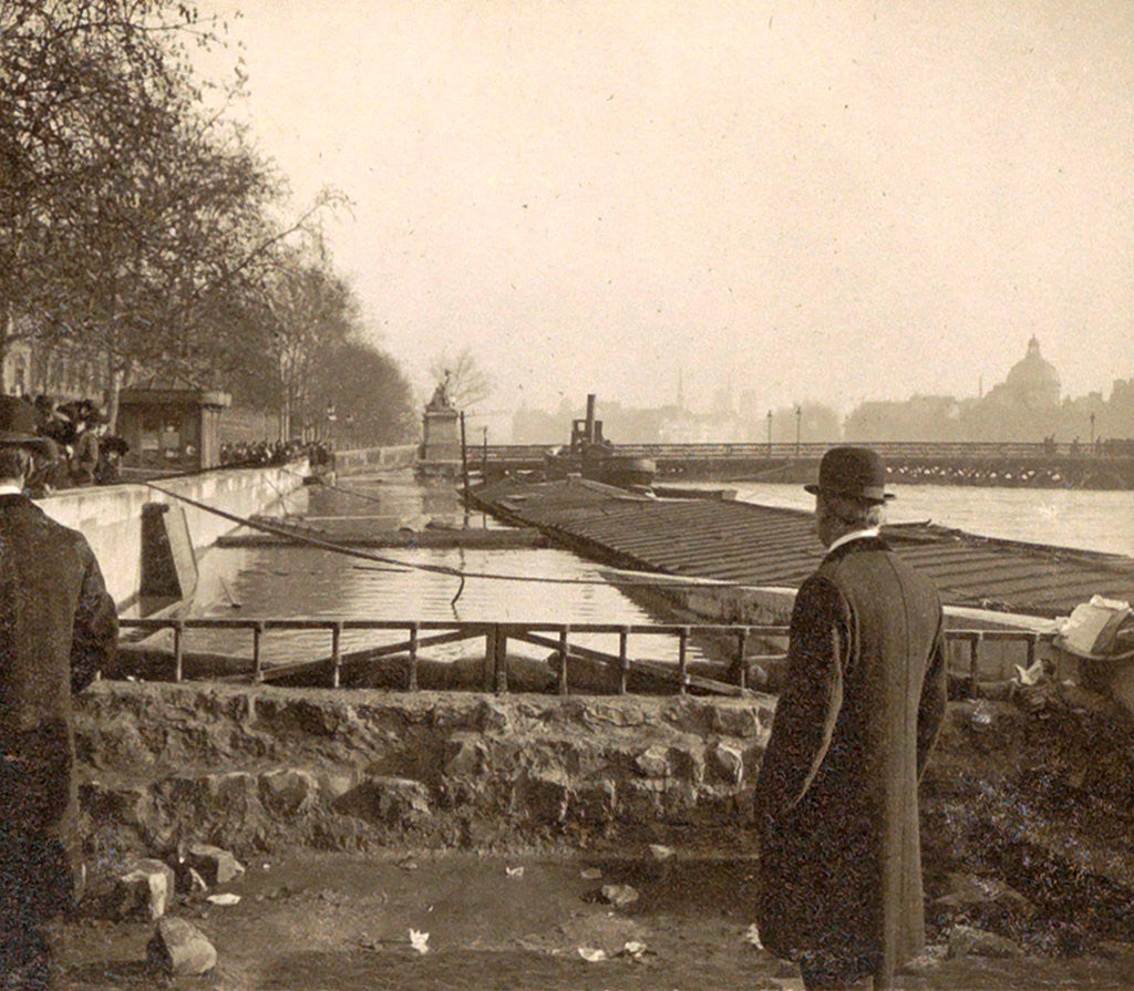 Detail of People look at the high elevations of the Seine during the flooding of Paris by France