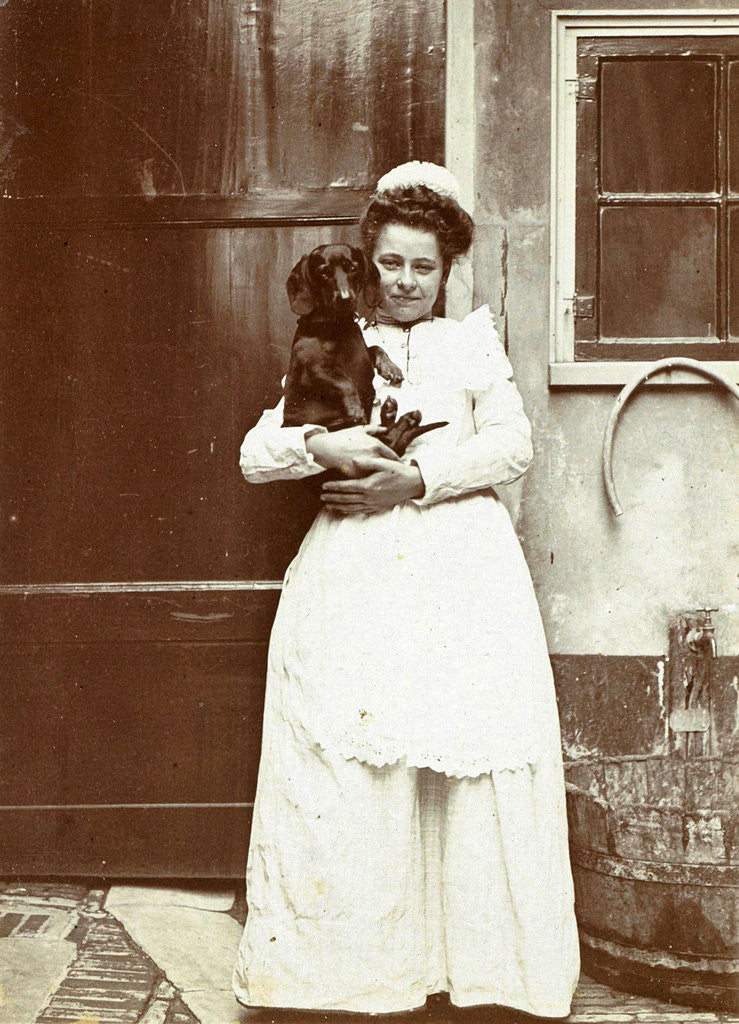 Detail of Maid with a dachshund in her arms at an outside tap by Anonymous