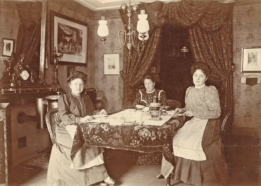 Detail of Three women sitting at table at meal by Anonymous