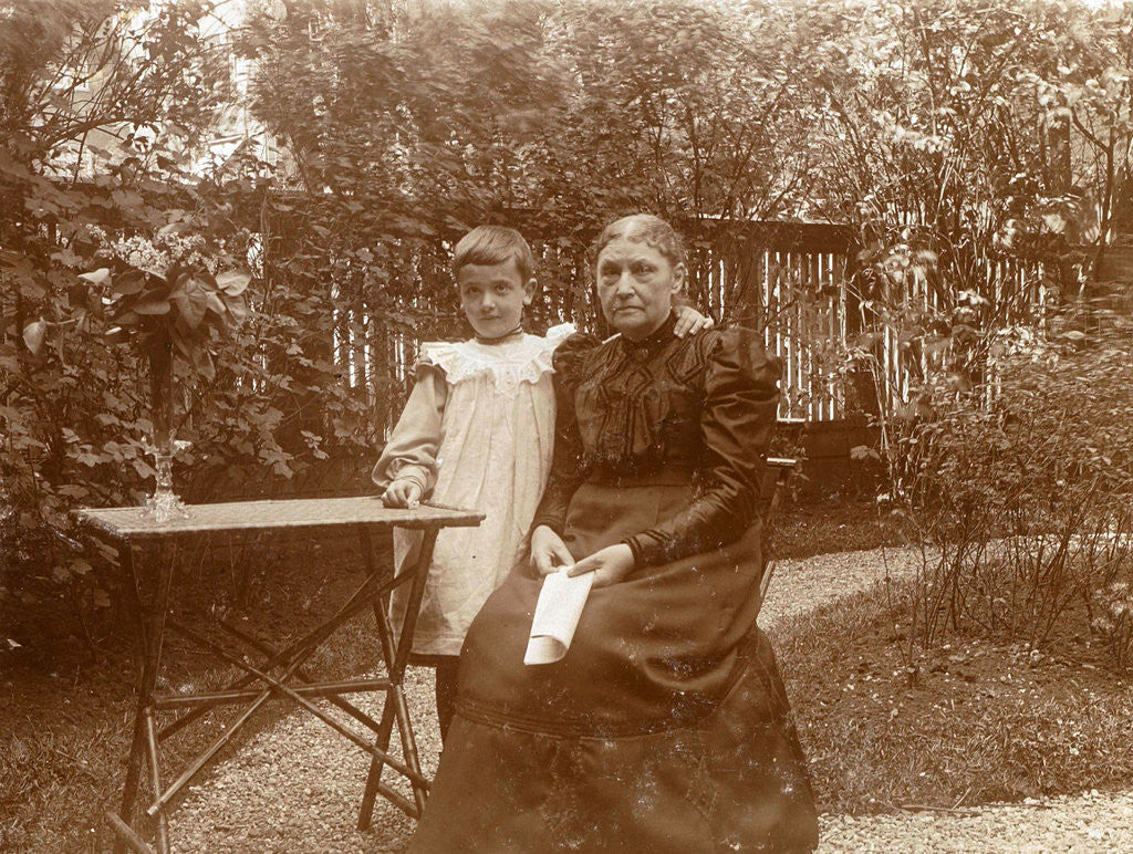 Detail of Woman with a child at a table in a garden by Anonymous