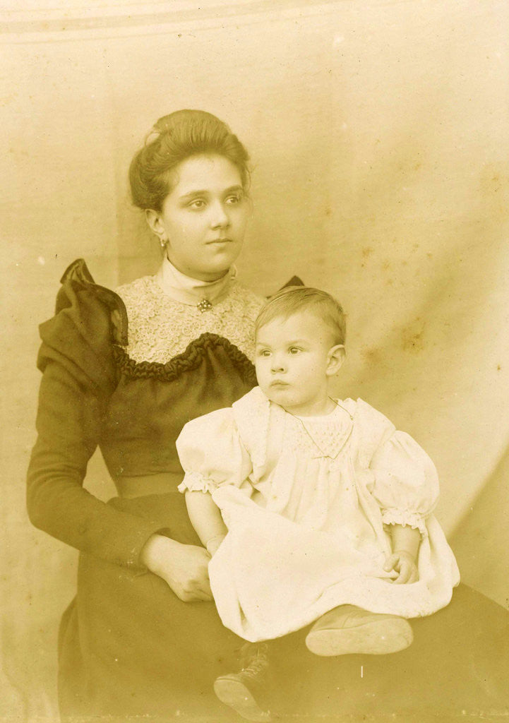 Detail of Part of album with family photos by Anonymous