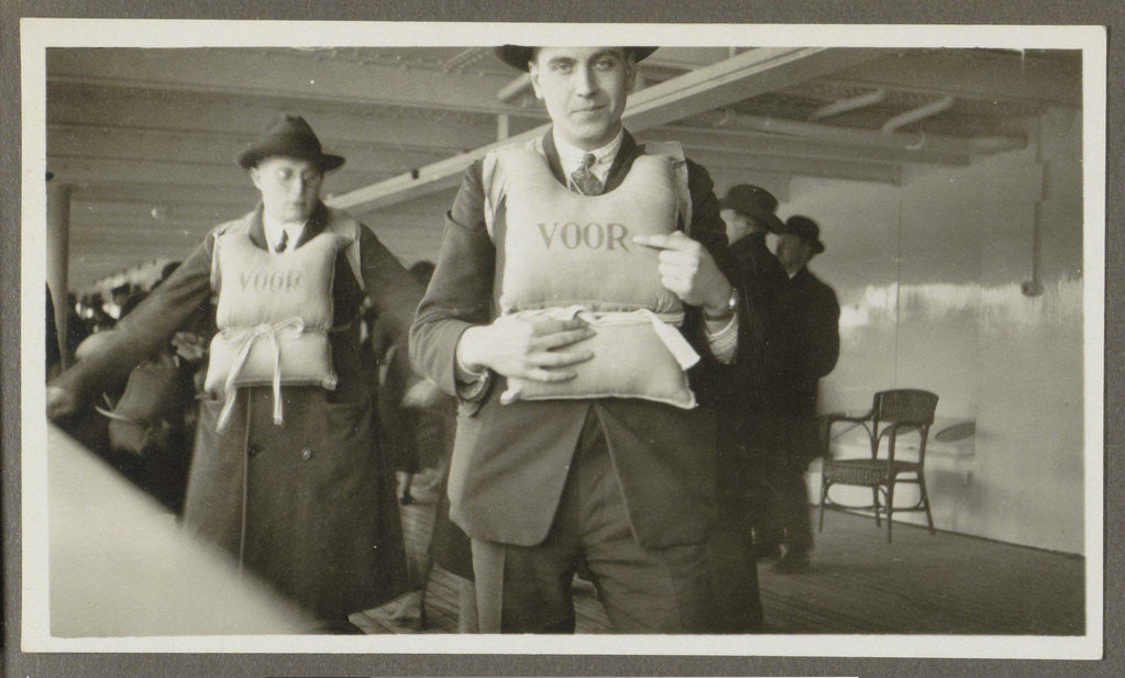 Detail of Two men wearing life jackets on board a ship by Anonymous
