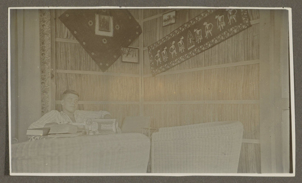 Detail of Man sitting at a table by Anonymous