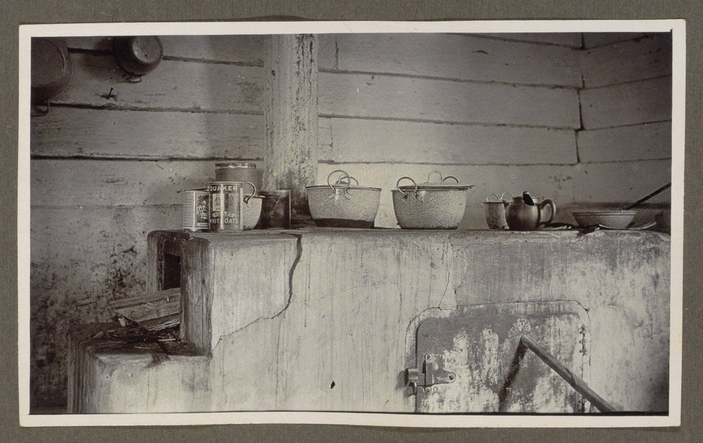 Detail of stove with pans and food by Anonymous