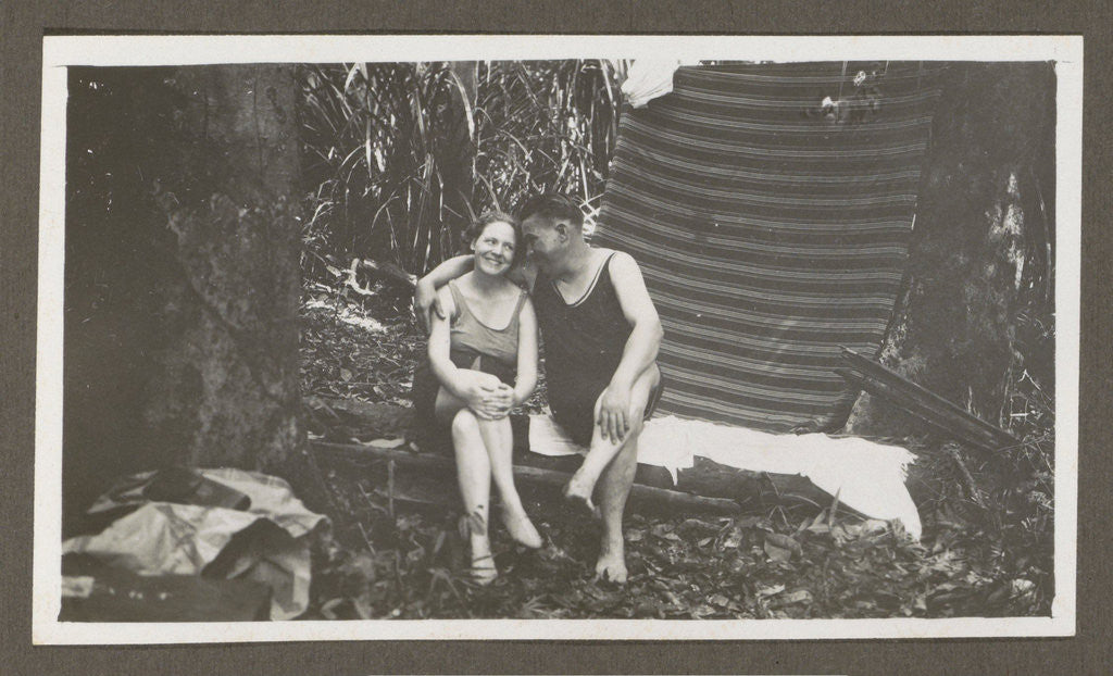 Detail of Man and a woman in swimwear on a bench in a forest by Anonymous
