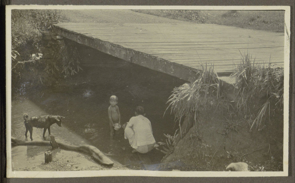 Detail of woman, a child and a dog on the bank of a stream by Anonymous