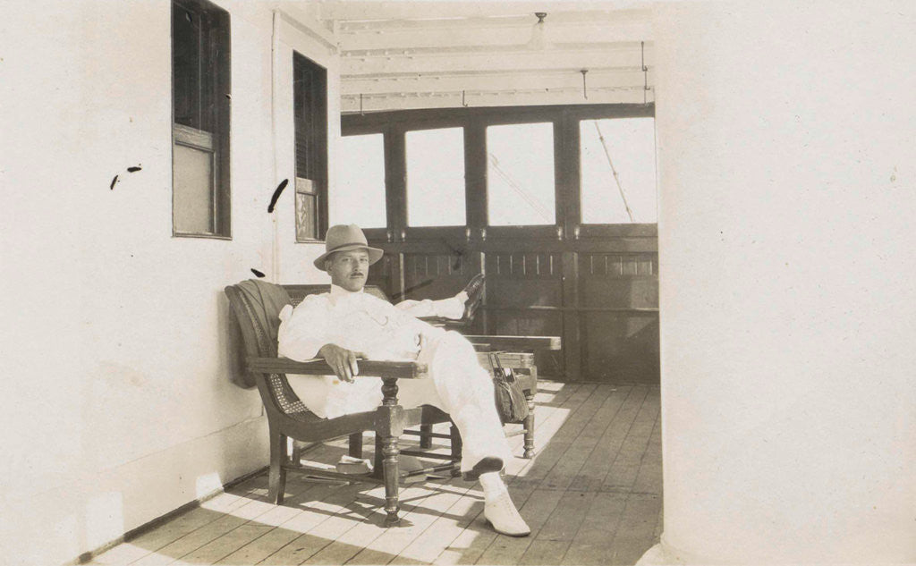 Detail of aboard boat to Java, Indonesia, seated man by Anonymous