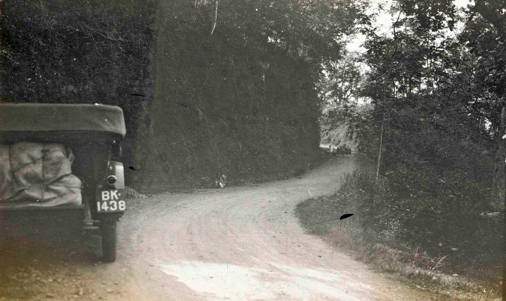 Detail of Priangan, cars on the road past the Tji Sokan, Indonesia by Anonymous