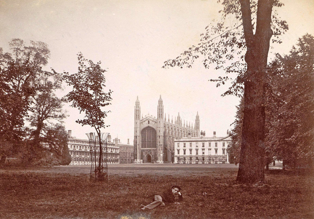Detail of Chapel of King's College, Cambridge, with a man in the foreground lying on a lawn UK by Anonymous