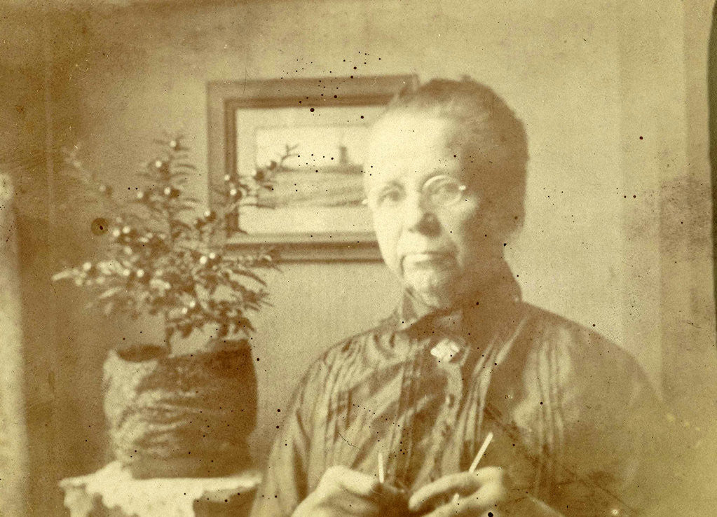 Detail of Portrait of an old lady with glasses in a living room by Anonymous