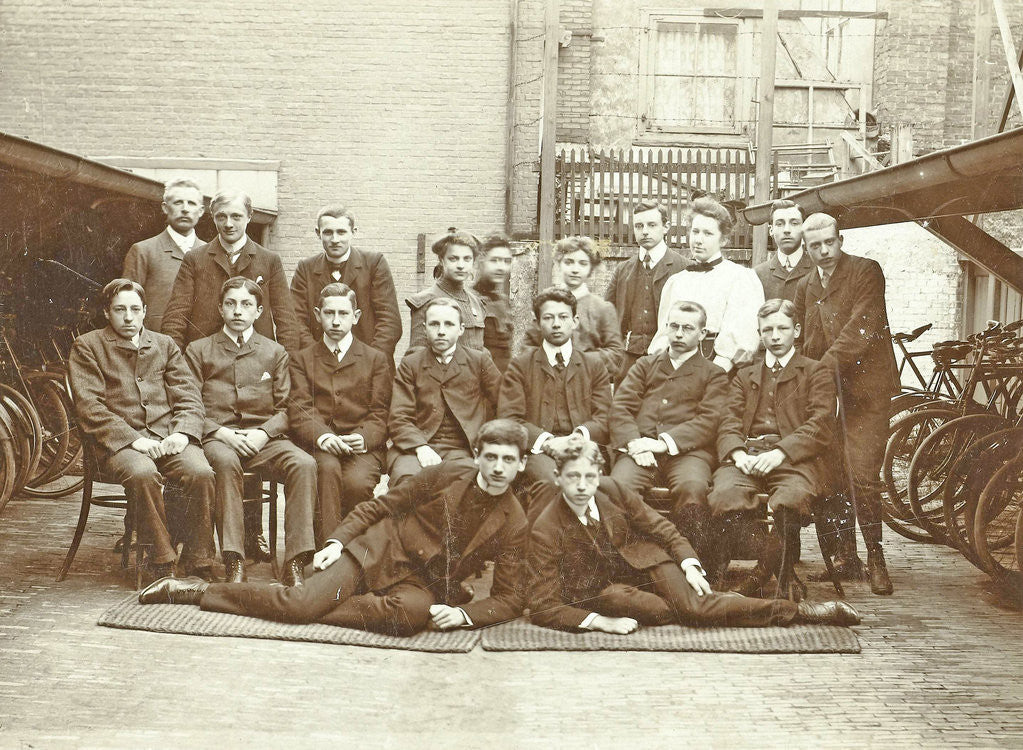 Detail of Group portrait of young men and women between two bike sheds by Anonymous