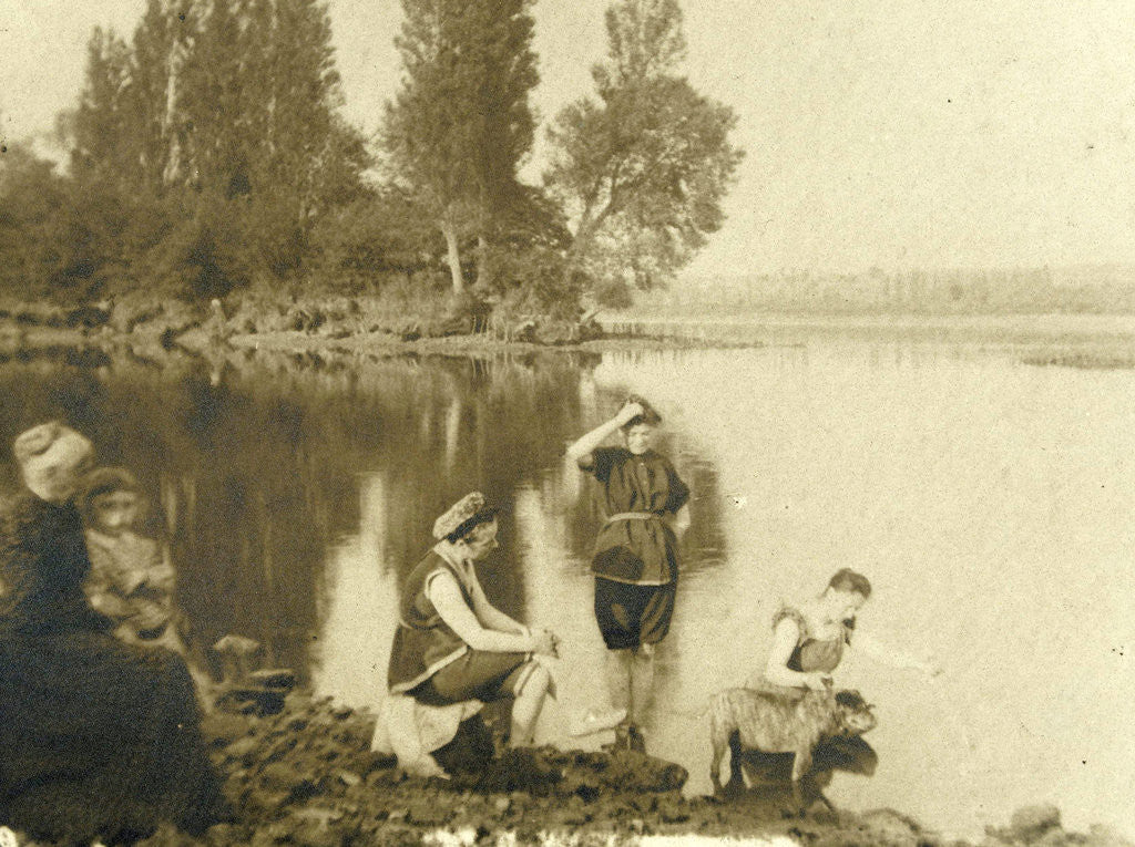 Detail of Family near the water in swimwear by Anonymous