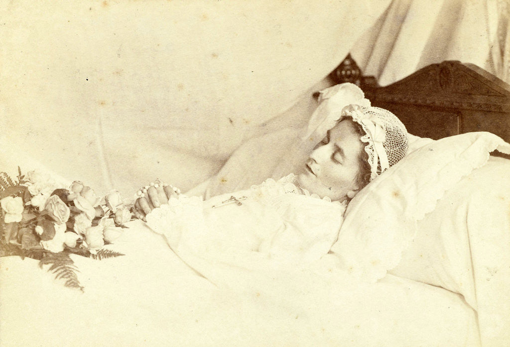 Detail of Post mortem portrait of a deceased woman; she is wearing a hat and holding a bunch of roses and a rosary between her clasped hands by Anonymous