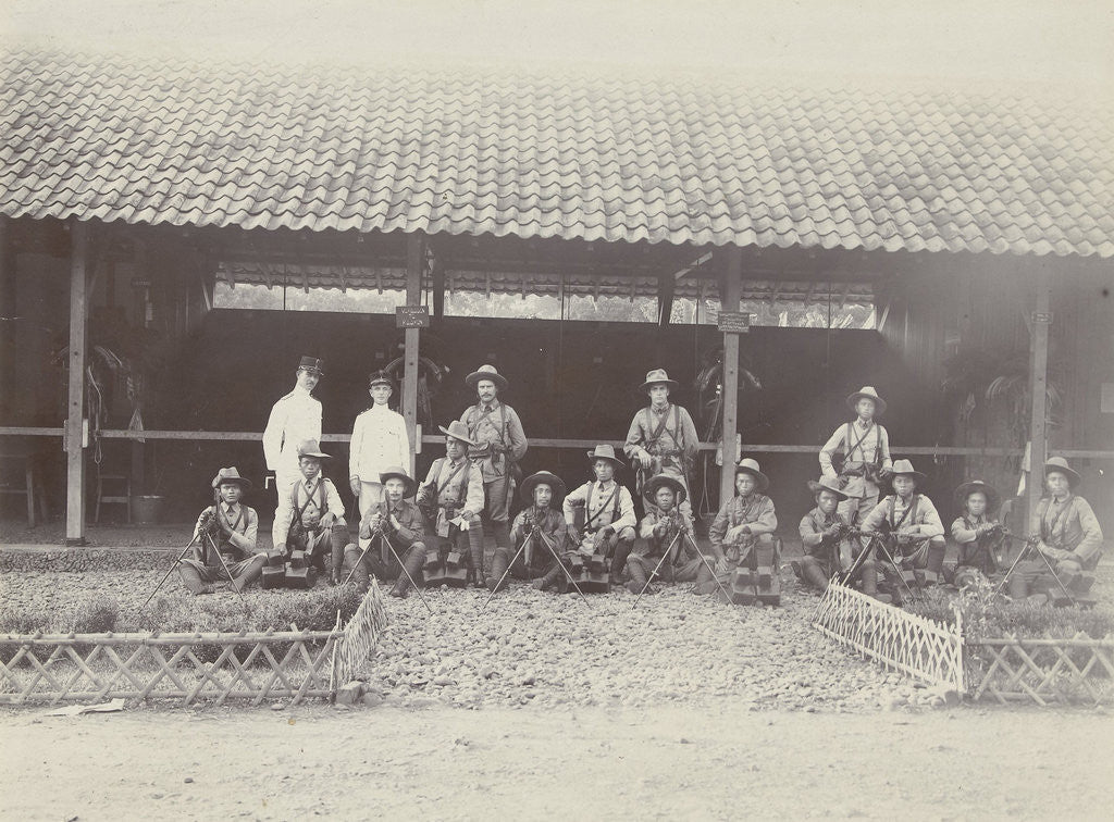Detail of Group portrait of KNIL soldiers with machine guns for a stable by Lik Sun Bros