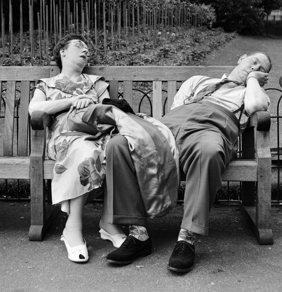 Detail of Old couple dozing in the sun at Serpentine Lido by Bob Hope