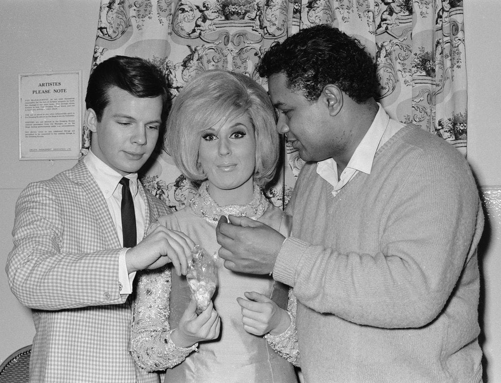 Detail of Bobby Vee, Dusty Springfield and Big Dee Irwin share the sweets by Alfred Markey