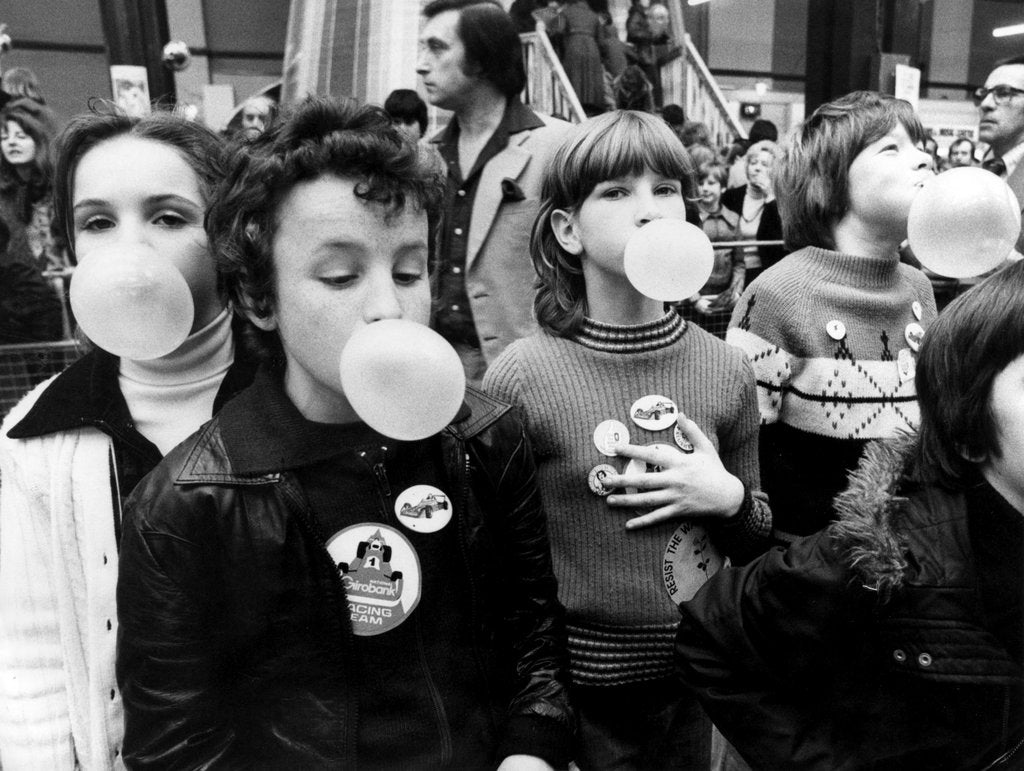 Detail of Children blowing bubble gum at Alexandra Palace by Charlie Ley